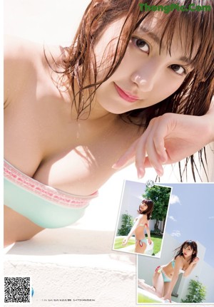 A woman in a pink bikini sitting on a bed.