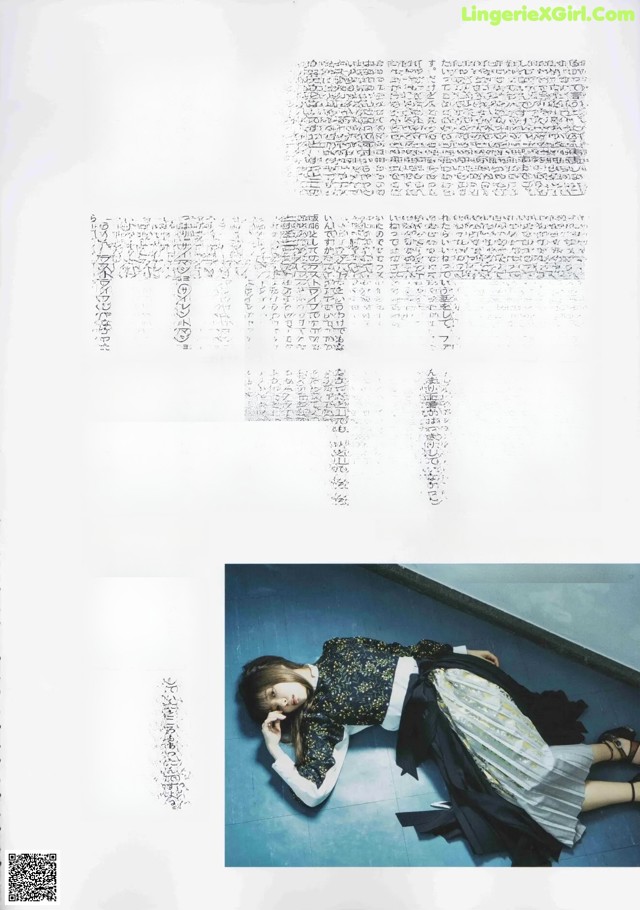 A magazine spread with a woman laying on the floor.